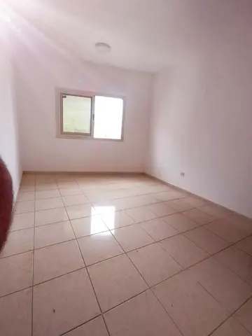 **English Translation (updated):** 1 Bedroom Hall for annual rent Good space and well-maintained finishing Prime location close to all services Rent