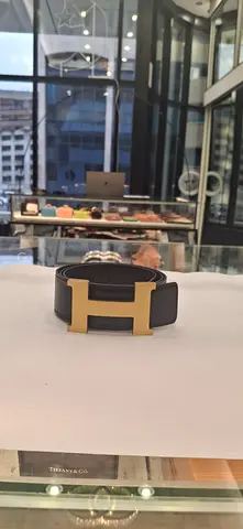 Pre-owned black leather belt with gold H buckle