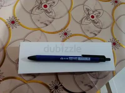 My blue retractable ballpoint pen — good condition