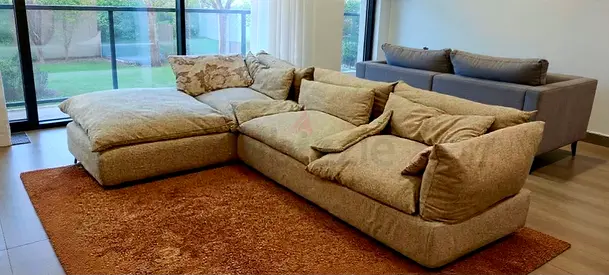 Marina home Leather sectional sofa with footstool