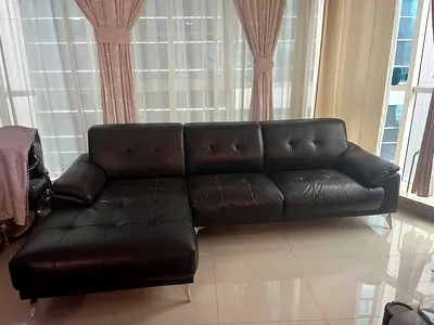 Dark brown L-shaped leather sofa with chaise - used, good condition
