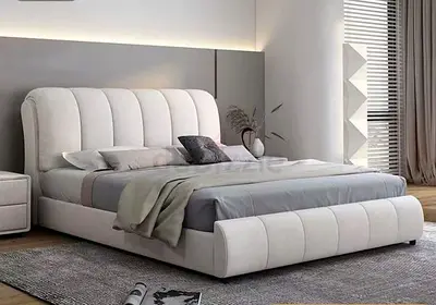 Modern upholstered platform bed with padded headboard and footboard