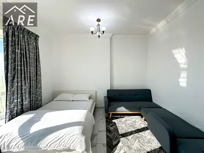 One-bedroom apartment with a living room for monthly rent in Al Waha Towers, Ajman