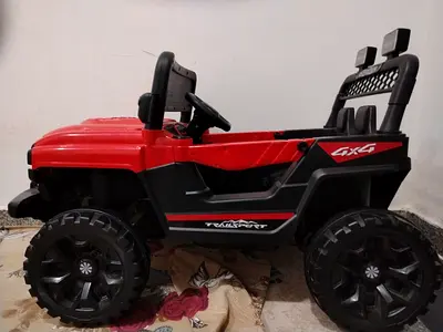 Red 4x4 Electric Ride-On Jeep for Kids (Used) but new box and charger available