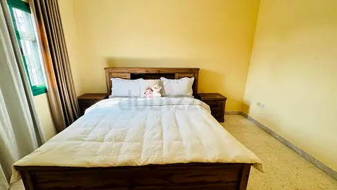 Solid wooden bed frame with matching nightstands