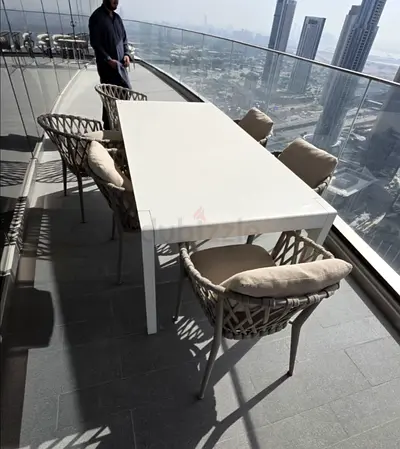 Selling Great Condition Outdoor dining table with six chairs For sale