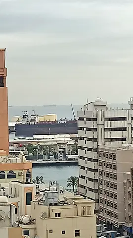 One-bedroom family apartment with balcony and central AC in Al Rolla, Sharjah, near transport and amenities.