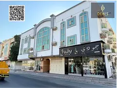 Prime Mixed-Use Building for Sale Near Abaya Roundabout, Al Rawda 3 – Main Road Facing | High Rent