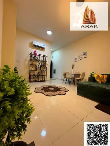A premium VIP furnished one-bedroom apartment with a living room – second tenant is available for monthly rent in Ajman – Al Rawda Two