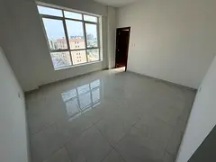 Two bedrooms and a living room - annual rent - Ajman Corniche - central air conditioning - maintenan