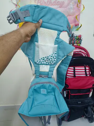 Light blue ergonomic baby front carrier — used, clean