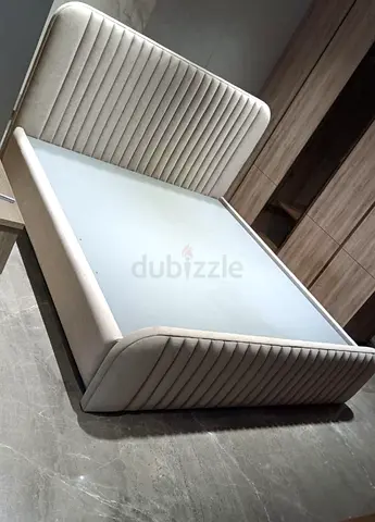 Stylish and Modern Bed with Upholstered Headboard