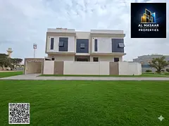 Villa in Al Rawda 1 area, corner plot on two streets, central air conditioning, 5 master bedrooms, f