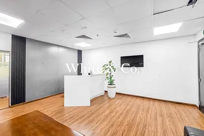 FITTED AND PARTITIONED | Mid-Floor | DMCC