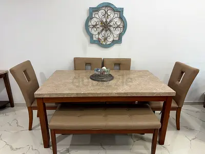 Dining table with marble top