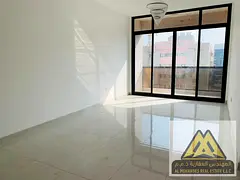 A first-occupancy 1-bedroom apartment with living room is available for annual rent in Al Hamidiya A