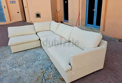 Home centre swin feather filled sofa with footstool