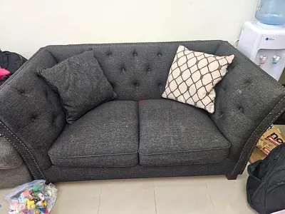 Stylish Grey Sofa with Cushions