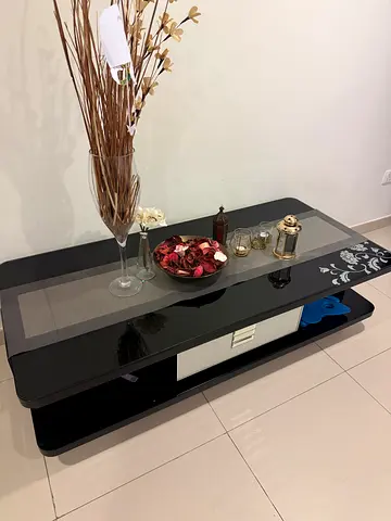 Stylish Black Coffee Table with Decorative Accents