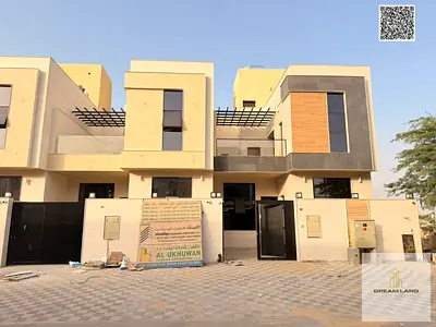 Modern townhouse in Al Yasmin, price includes registration fees and air conditioning, negotiable.
