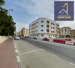 Building for sale in Muweileh area, corner lot on 3 streets, 9% return, second plot from the main st