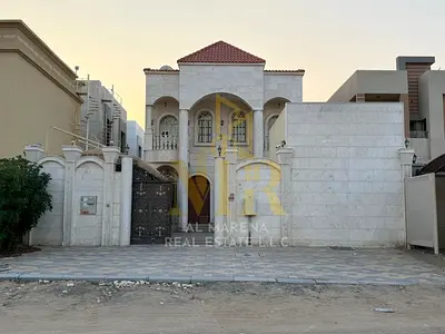 Stunning villa for sale, 5000 sq ft, including water, electricity, and air conditioning - Ajman, main street, freehold, open to all nationalities