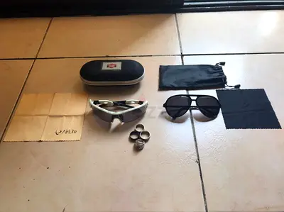 Two sunglasses (aviator + sport) with cases and cleaning cloths