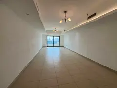 Spacious three-bedroom apartment with a living room in Al Khan / free air conditioning / free parkin