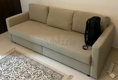 Comfortable Beige Sofa-bed with storage