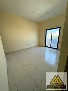 1 Bedroom Apartment for Annual Rent in Al Naeemiyah 2, Ajman Balcony Closed Kitchen Central AC Spaci