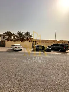 Villa in Al Rawda 1 area, corner plot on two streets, central air conditioning, 5 master bedrooms, f