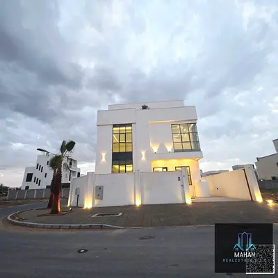 Peace be upon you. Luxurious Villa for sale in Al Zahia, Ajman (private construction). New villa, I am the Owner. *Corner of two streets. *3 floors. *7 master bedrooms, maid's room, living room, and h