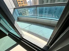 Luxury two-bedroom apartment with a living room in Al Taawun / free air conditioning / balcony with