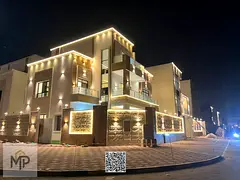 Corner villa near Sheikh Mohammed bin Zayed Road and the mall, two floors and a roof, 6 master bedro