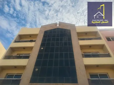 Building for sale in Muwailih area, on a main street and a back street, in an excellent location for investment.