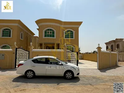 Stunning villa for sale, 5000 sq ft, including water, electricity, and air conditioning - Ajman, main street, freehold, open to all nationalities