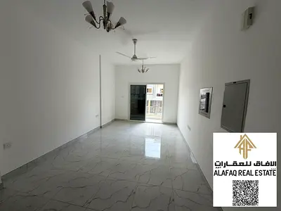 شقة غرفتين وصالة للإيجار في المويهات 3 بعجمان حمامين وبلكونة تكييف مركزي جديد ثاني ساكن مساحات واسعة قريب المدارس ومحمد بن زايد