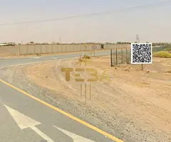 Corner Plot for Sale in Manama 13 – Prime Location near the Mosque