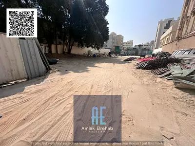 ارض سكني استثماري ارضي واربع طوابق مساحة 5600 قدم مربع قرب حديقة النعيمية