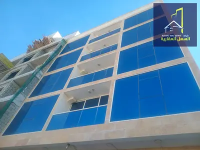 For sale in Muweileh area (Al-Falah Camp), with a 9% return, prime location, second plot from the main road.