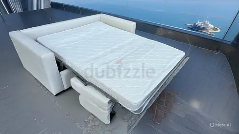 Natuzzi two seater sofa bed with mattress