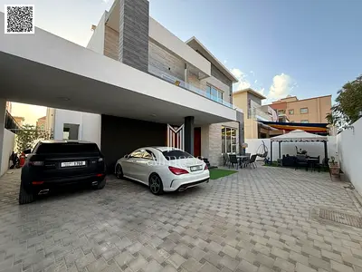 Villa for sale in Al Mowaihat fully inclusive of air conditioning, water, electricity, and furniture, with a prime location and available for bank financing