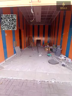 Commercial Shop in Al Mowaihat 2 on Main Road – Ideal for Auto Services or Any Business