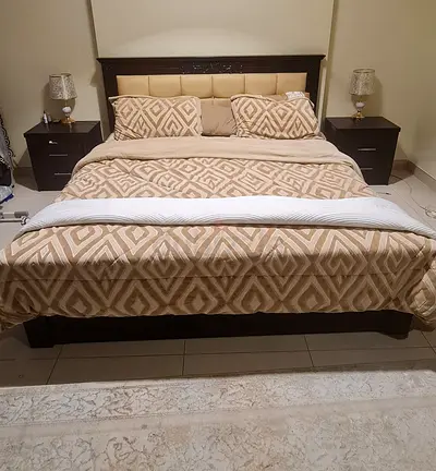 Elegant King Size Bed with Nightstands and Dressing Table