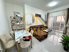 Fully furnished apartment with central air conditioning and an open view, ready for immediate occupa