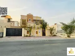Villa in Al Rawda 1 area, corner plot on two streets, central air conditioning, 5 master bedrooms, f