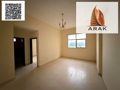 Two-bedroom apartment with a living room for rent in Al Jurf 1, in a prime location close to schools and next to Ammar Street, offering easy access to