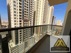 Annual rental available – Ajman, Al Amerah area A spacious one-bedroom apartment with a living roo