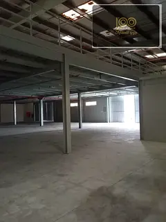 Warehouse for sale in Al Jurf Industrial, 14,000 sq ft with mezzanine and 50 KW power. Ideal for inv