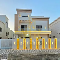 Luxury villa in Al Yasmin – 5 master bedrooms with a majlis, 2 living rooms, and a modern kitchen,